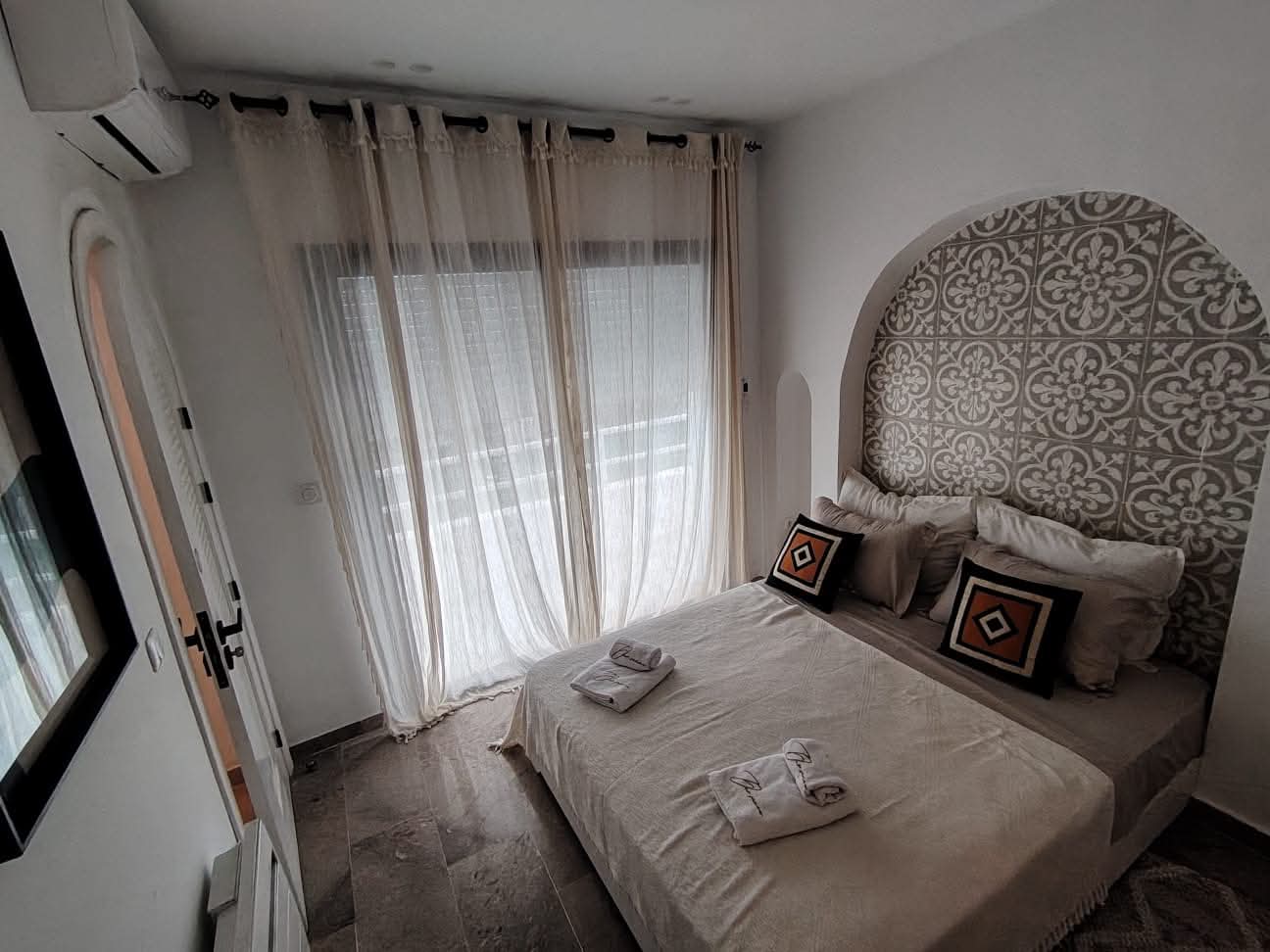 Air-conditioned bedroom at Villa Lumina