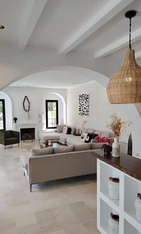 Bright arched living space at Villa Lumina